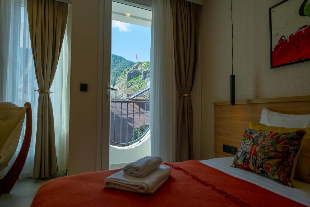 Postel nebo postele na pokoji v ubytování Uva Rooms