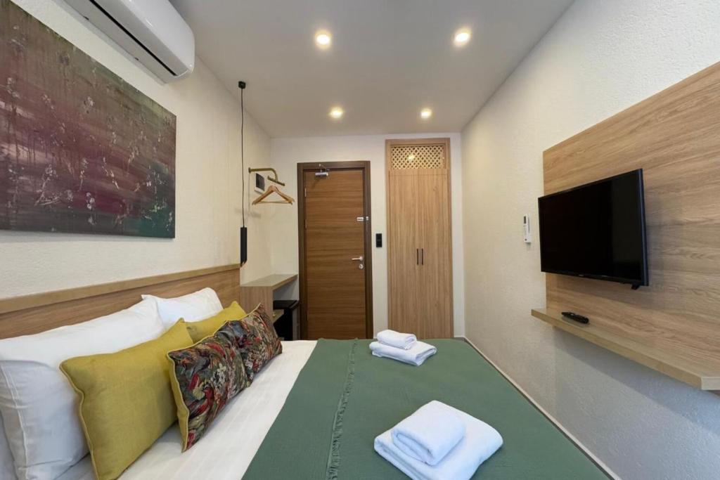 TV a/nebo společenská místnost v ubytování Uva Rooms