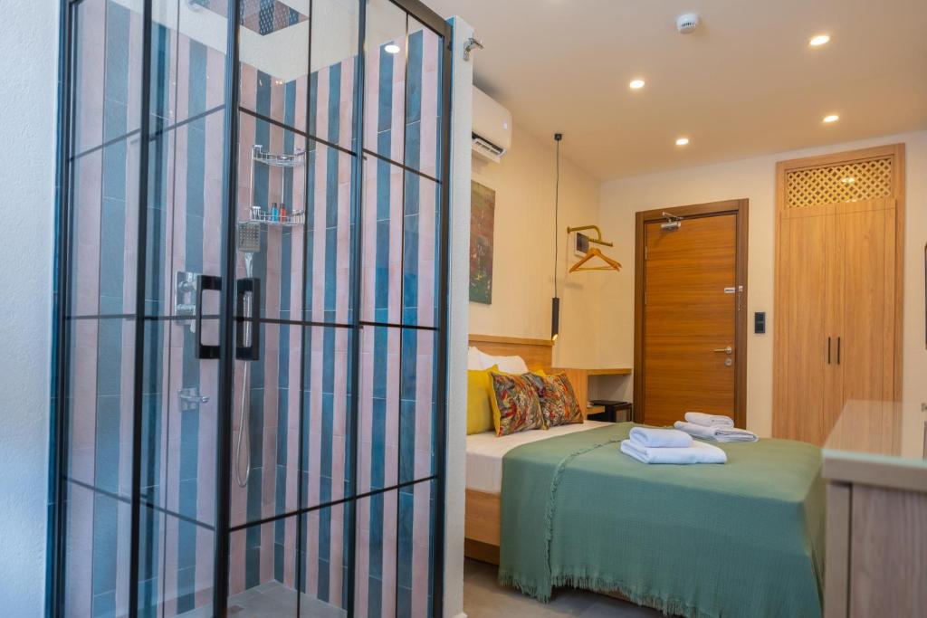 Postel nebo postele na pokoji v ubytování Uva Rooms