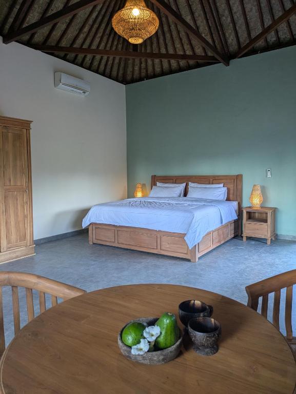 Postel nebo postele na pokoji v ubytování Villa Palmeras