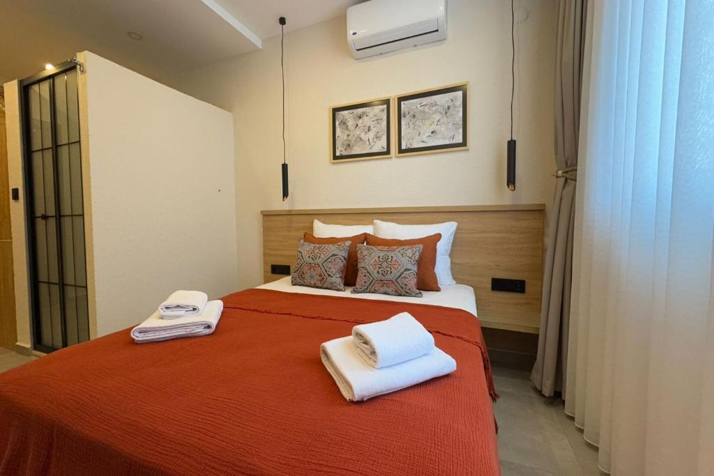 Postel nebo postele na pokoji v ubytování Uva Rooms
