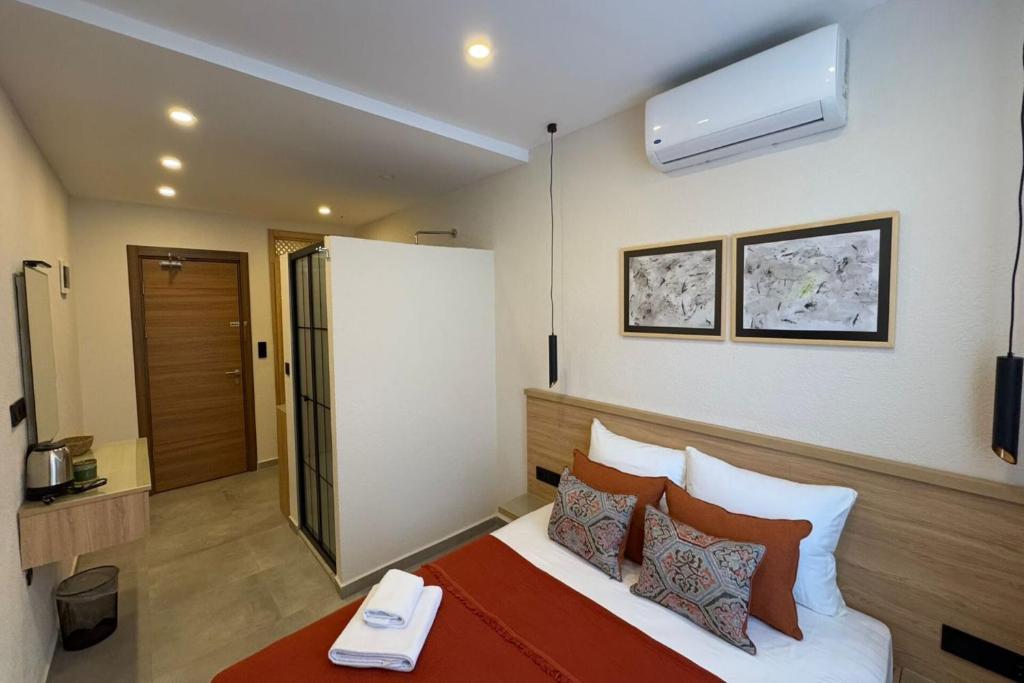 Postel nebo postele na pokoji v ubytování Uva Rooms