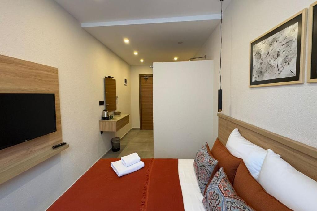 TV a/nebo společenská místnost v ubytování Uva Rooms