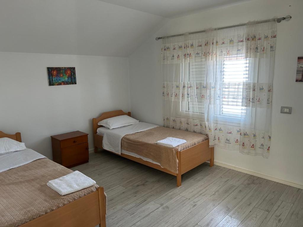 Postel nebo postele na pokoji v ubytování HENRI'S APARTAMENT