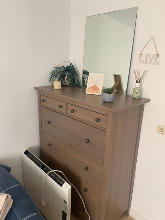 TV a/nebo společenská místnost v ubytování acogedor apartamento 2 dormitorios