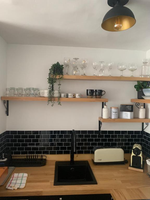 Kuchyň nebo kuchyňský kout v ubytování acogedor apartamento 2 dormitorios