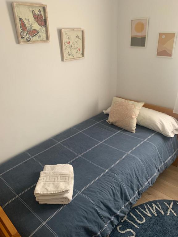 Postel nebo postele na pokoji v ubytování acogedor apartamento 2 dormitorios