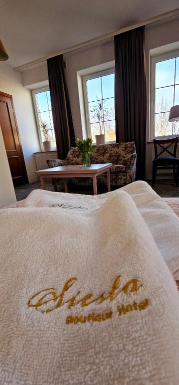 Postel nebo postele na pokoji v ubytování Hotel Siesta