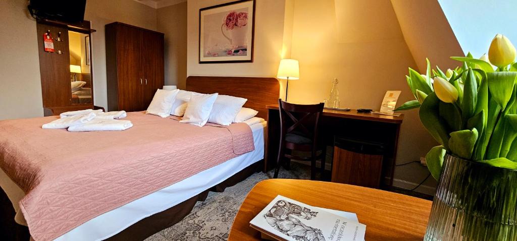 Postel nebo postele na pokoji v ubytování Hotel Siesta