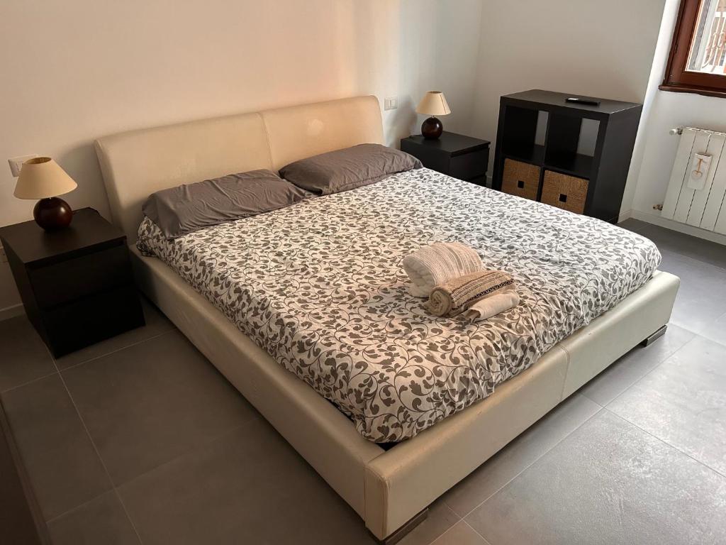 Postel nebo postele na pokoji v ubytování F&G downtown Milan Città Studi