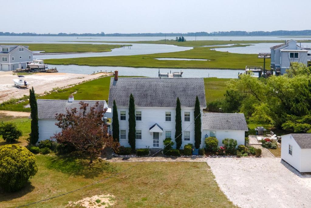 an aerial view of a house with a view of the water at Oyster Catcher - Pet friendly & deep water access! in Deep Hole