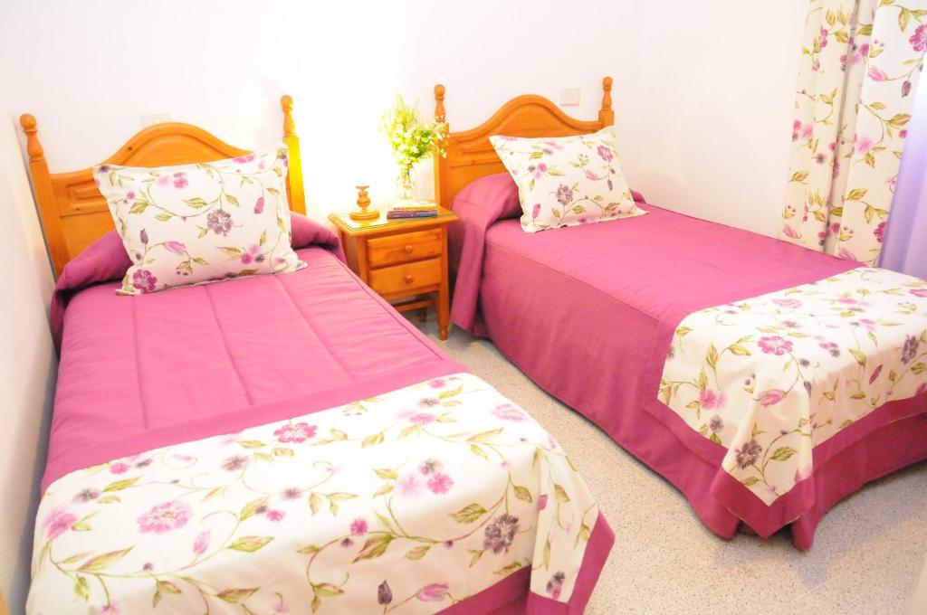 Posteľ alebo postele v izbe v ubytovaní EmyCanarias Holiday Homes Vecindario