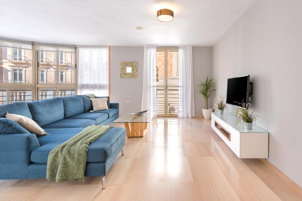 Televízia a/alebo spoločenská miestnosť v ubytovaní Vistas Panorámicas CALLE LARIOS Málaga