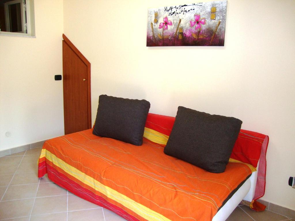 En eller flere senge i et værelse på Casa Vacanze Spadafora