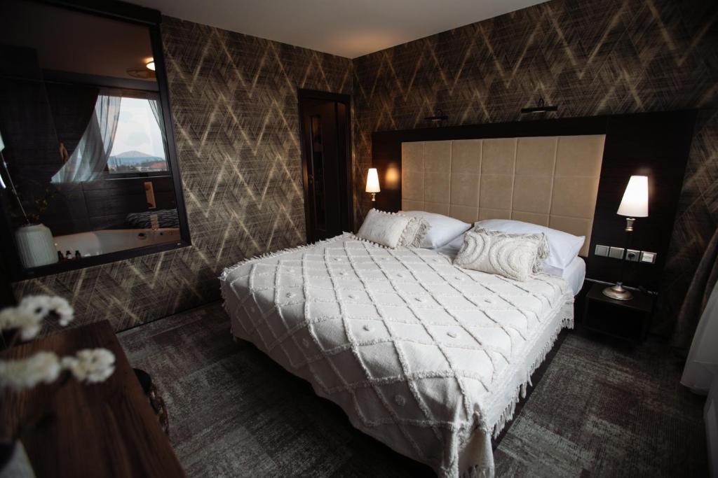 Postel nebo postele na pokoji v ubytování Interhotel Tatra
