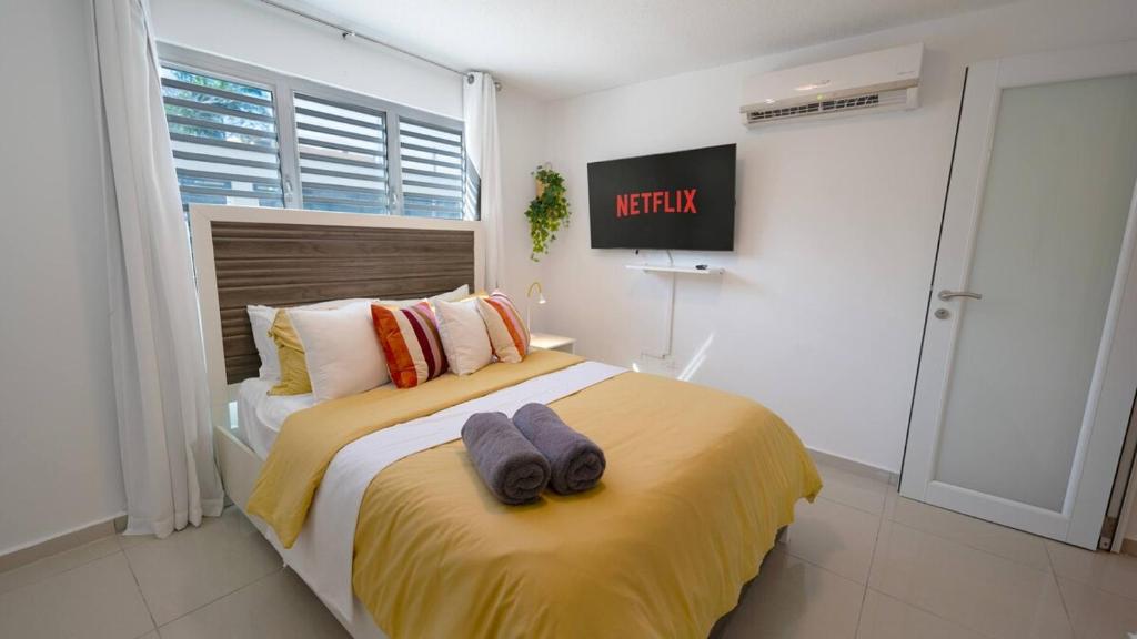 Postel nebo postele na pokoji v ubytování Aquaville Dorado Moderna Villa 2