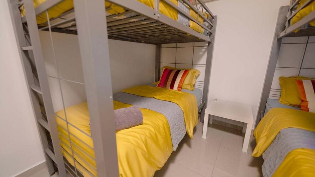 Postel nebo postele na pokoji v ubytování Aquaville Dorado Moderna Villa 2