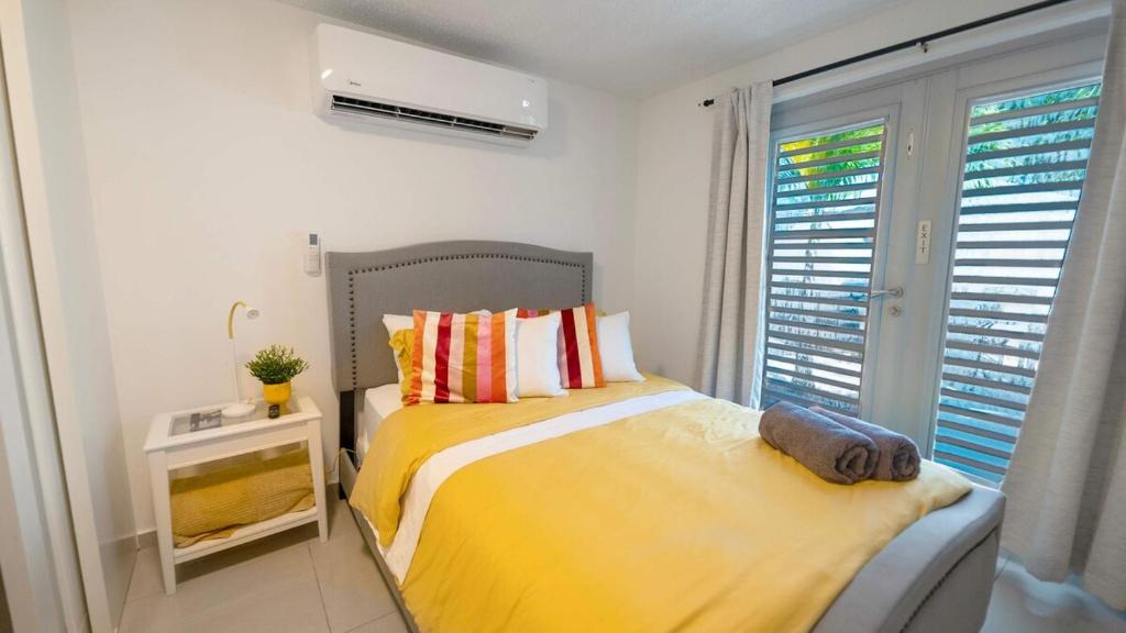 Postel nebo postele na pokoji v ubytování Aquaville Dorado Moderna Villa 2