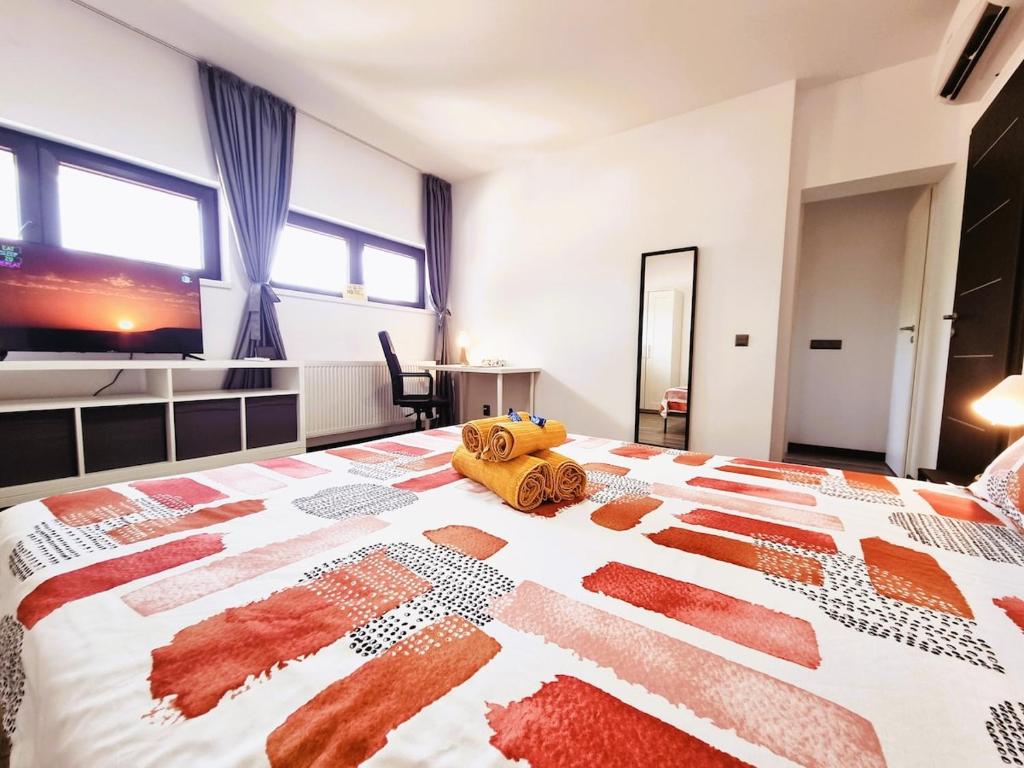 a bedroom with a bed with a teddy bear on it at Old Town Retreat Studio 9 in Bucharest
