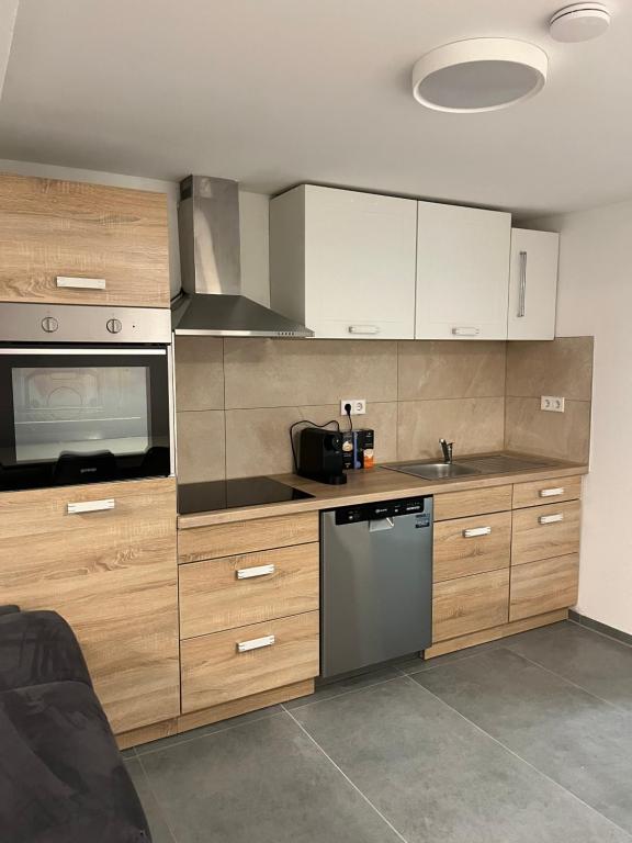 Kuchyň nebo kuchyňský kout v ubytování Wohnung