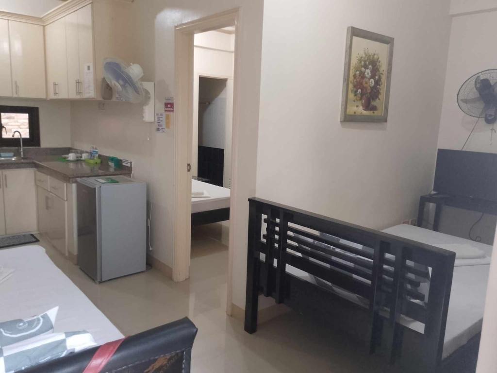 Kuchyň nebo kuchyňský kout v ubytování V.F. Riton Apartelle