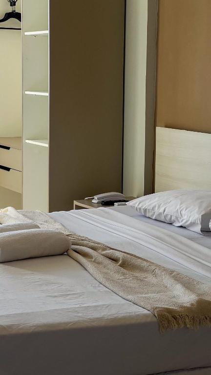 Postel nebo postele na pokoji v ubytování Hotel Boreas