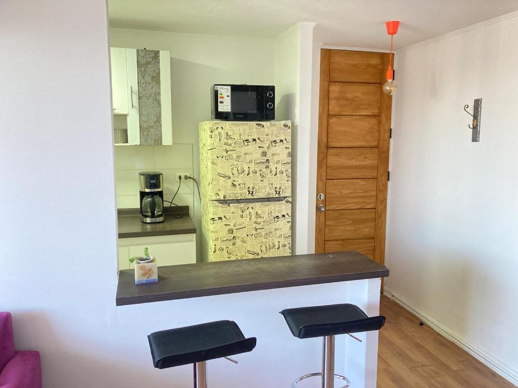 Kuchyň nebo kuchyňský kout v ubytování Departamento Amoblado