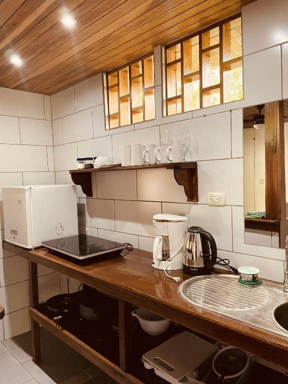 Kuchyň nebo kuchyňský kout v ubytování El Clan Hostel