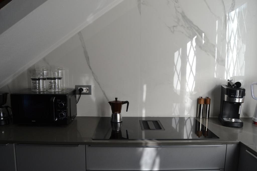 Kuchyň nebo kuchyňský kout v ubytování Jimbo's House - Comfort, Stile ed Eleganza!
