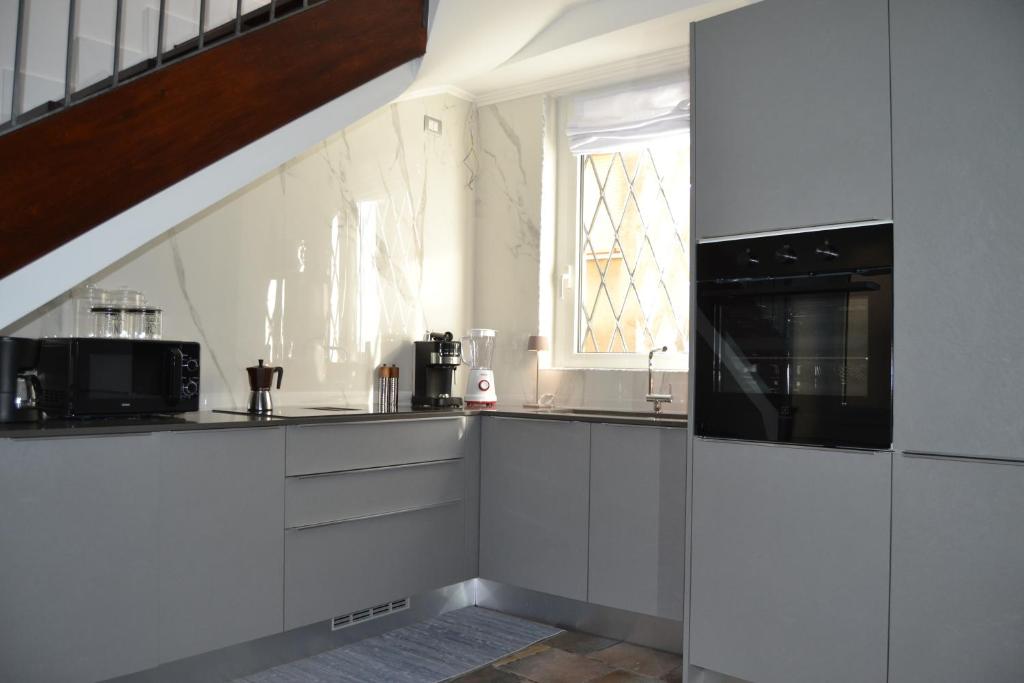 Kuchyň nebo kuchyňský kout v ubytování Jimbo's House - Comfort, Stile ed Eleganza!