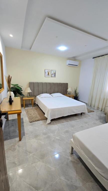 Postel nebo postele na pokoji v ubytování Appartements de luxe près de la mer
