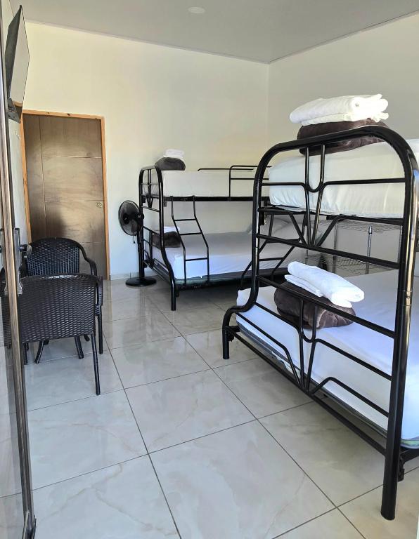 Postel nebo postele na pokoji v ubytování Hostel Cattleya - Monteverde, Costa Rica