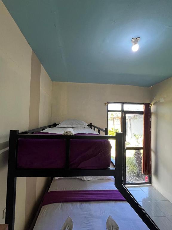 Postel nebo postele na pokoji v ubytování Abiiza Guest House