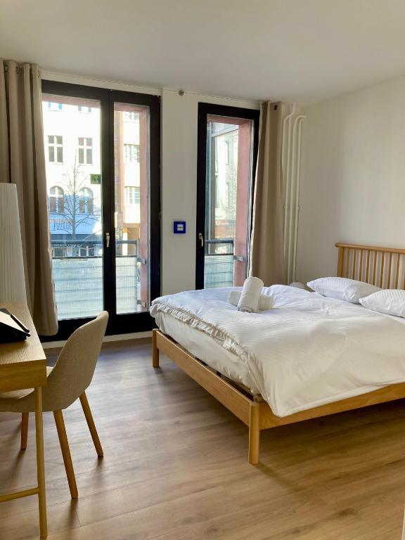 Postel nebo postele na pokoji v ubytování Minimal Hostel Kreuzberg