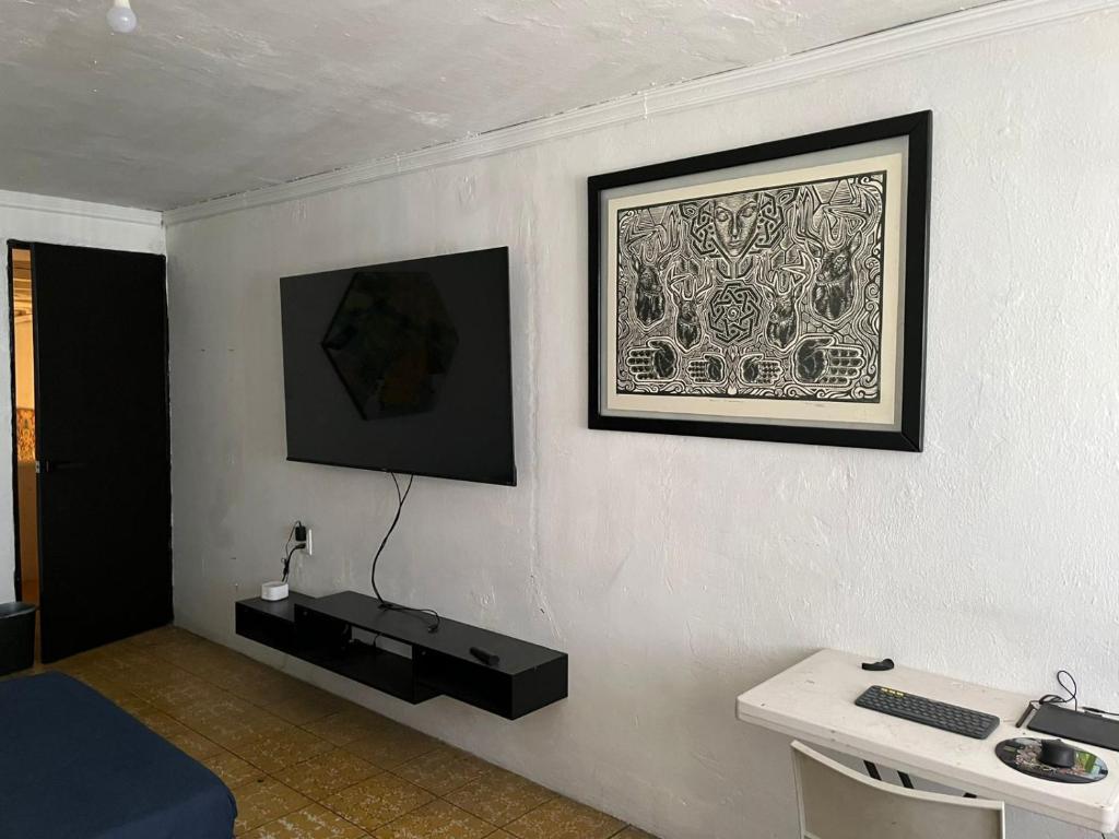 TV a/nebo společenská místnost v ubytování Hostal Centeno