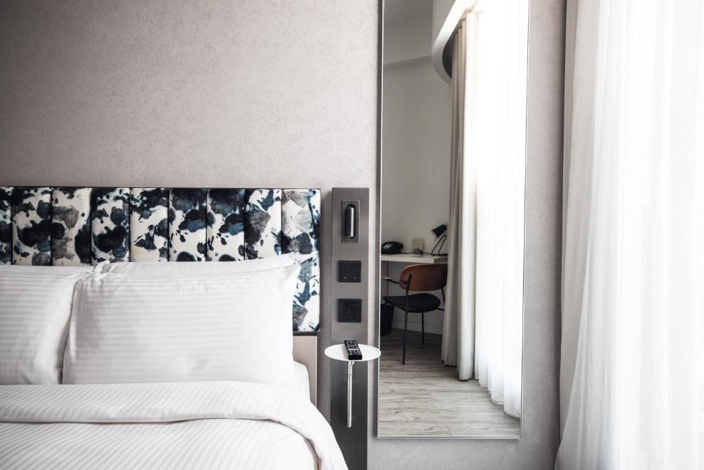 Letto o letti in una camera di Page148, Page Hotels