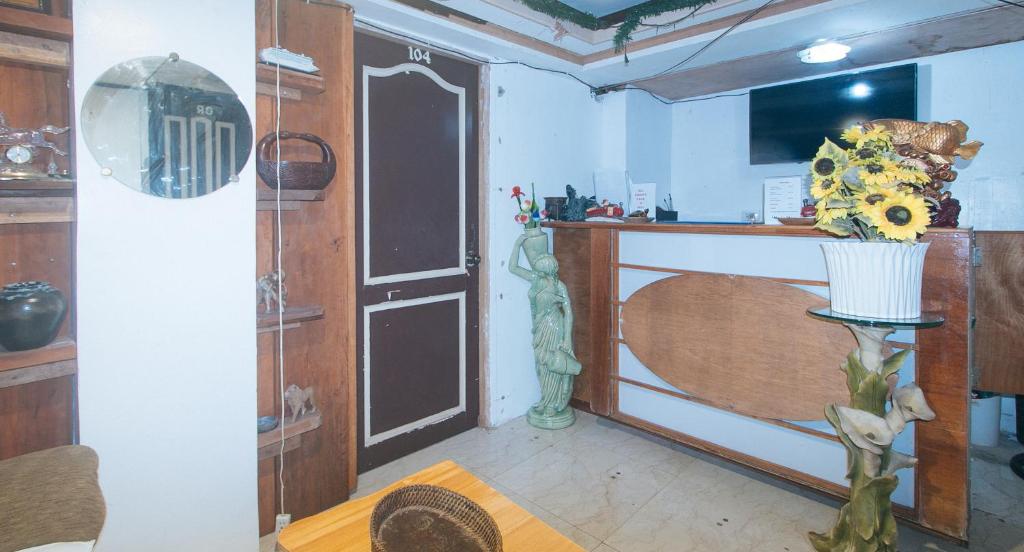 Kuchyň nebo kuchyňský kout v ubytování RedDoorz at Minas Place 1 Tacloban