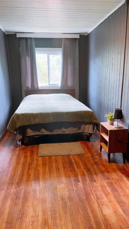 Postel nebo postele na pokoji v ubytování Hostal La Casona Ensenada con parking