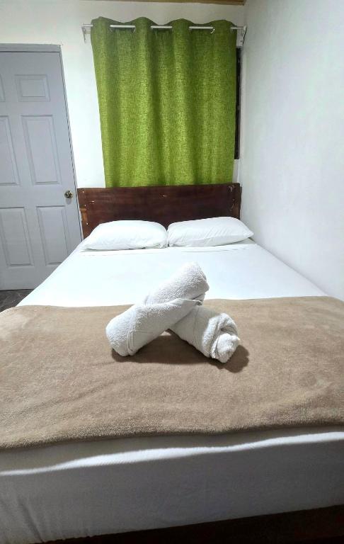 Postel nebo postele na pokoji v ubytování Hostel Cattleya - Monteverde, Costa Rica