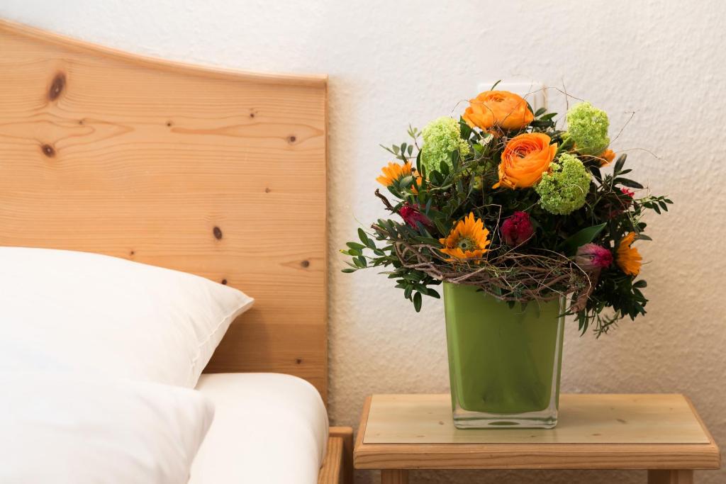 Postel nebo postele na pokoji v ubytování Hotel Sollner Hof