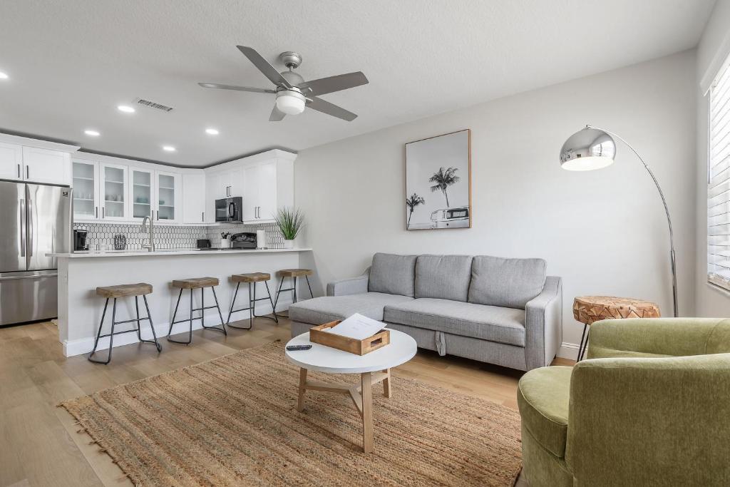 a living room with a couch and a table at 1053 Apollo Beach Blvd Unit 2 in Apollo Beach