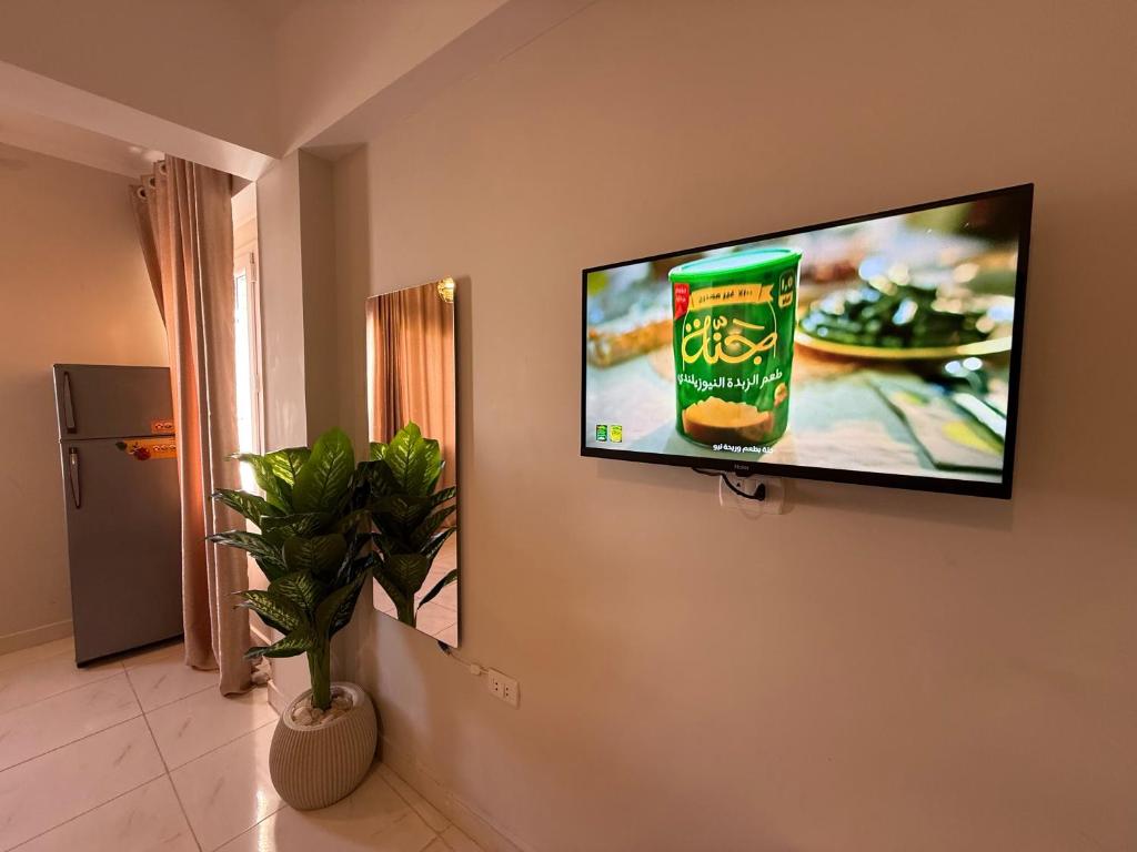 TV a/nebo společenská místnost v ubytování Every Day Hotel