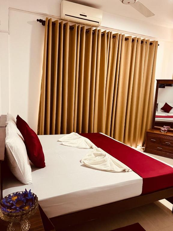 Postel nebo postele na pokoji v ubytování The Kandy Havens