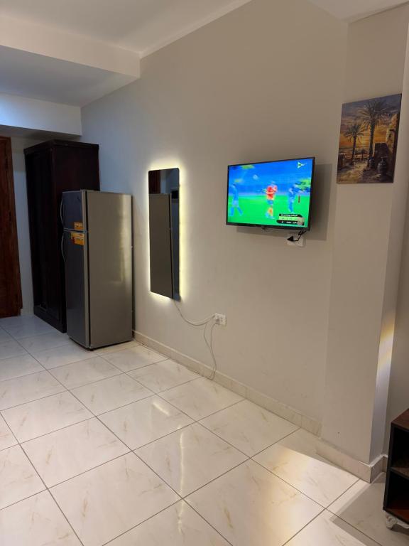 TV a/nebo společenská místnost v ubytování Every Day Hotel