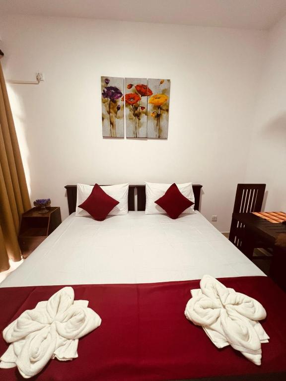 Postel nebo postele na pokoji v ubytování The Kandy Havens