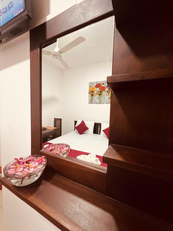 Postel nebo postele na pokoji v ubytování The Kandy Havens