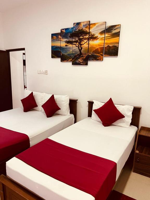 Postel nebo postele na pokoji v ubytování The Kandy Havens