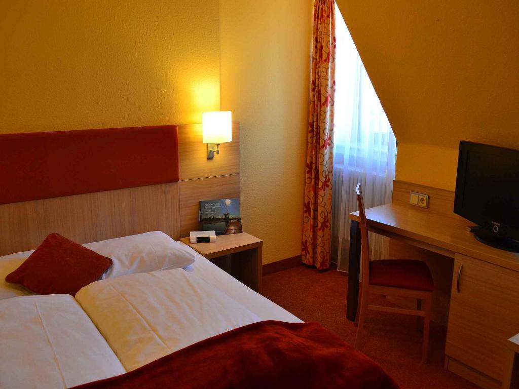 TV a/nebo společenská místnost v ubytování Hotel-Gasthof Rotes Roß