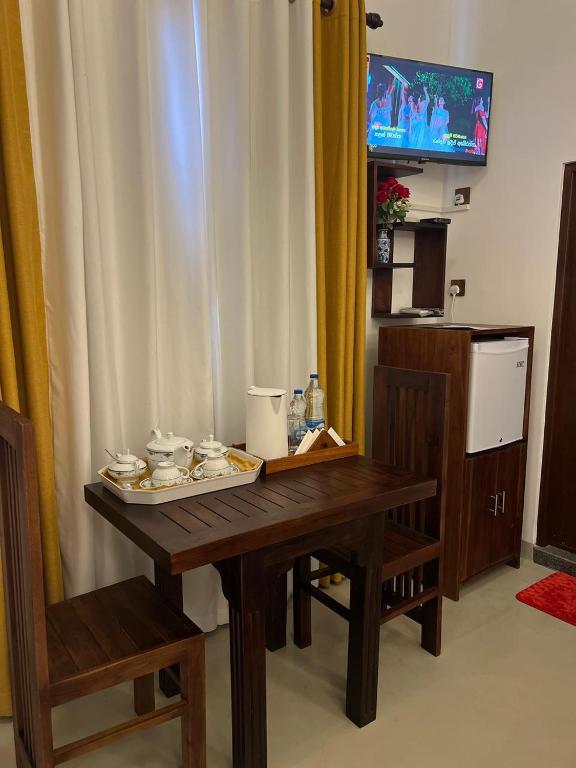 Příslušenství pro přípravu čaje a kávy v ubytování The Kandy Havens