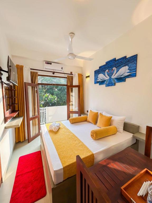 Postel nebo postele na pokoji v ubytování The Kandy Havens